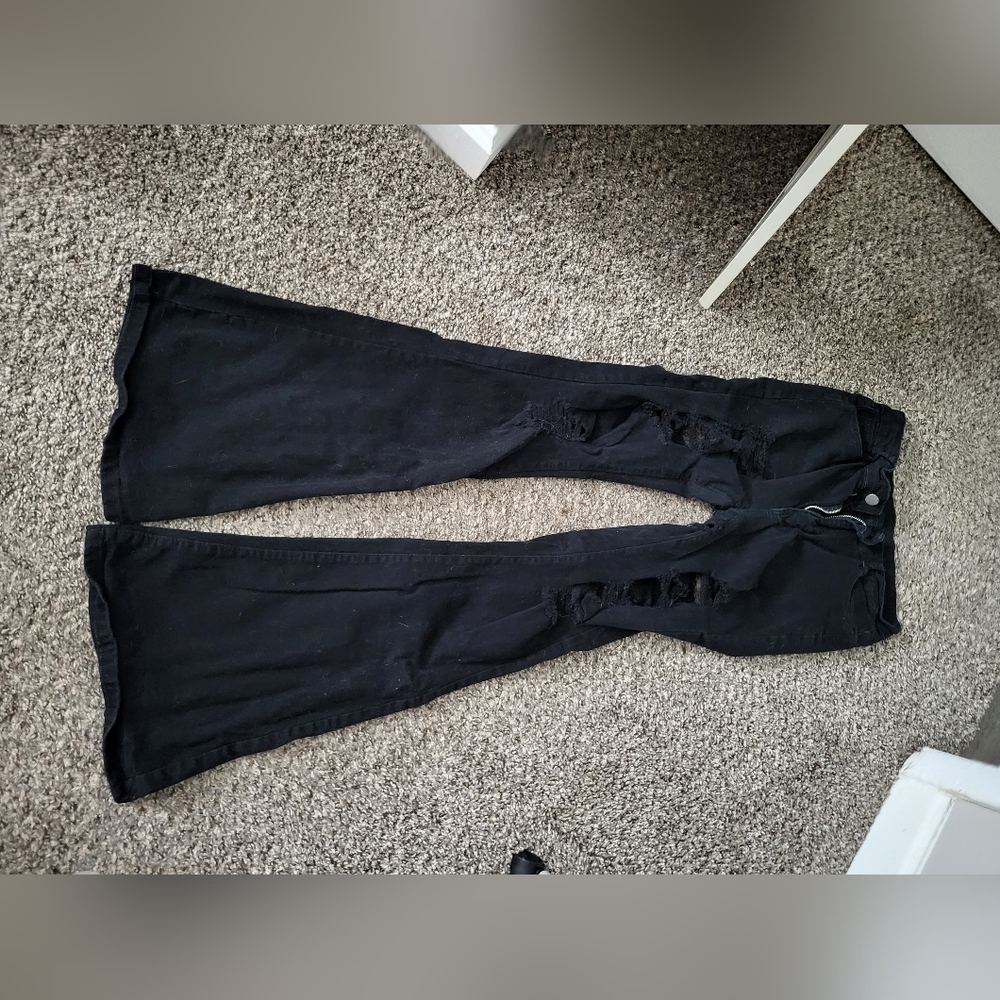 Black high waisted bell bottom ripped jeans